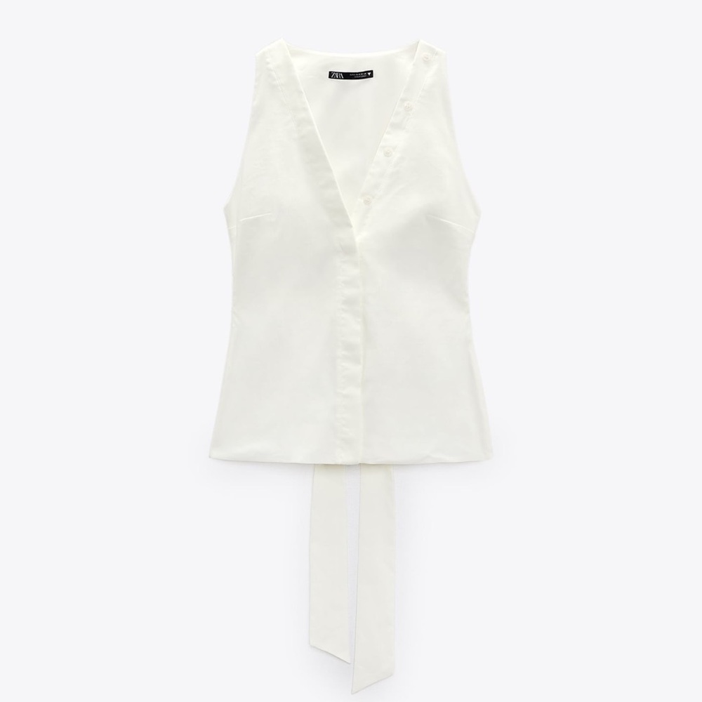 Halter neck linen top. Brand new with tags. Cut out back.